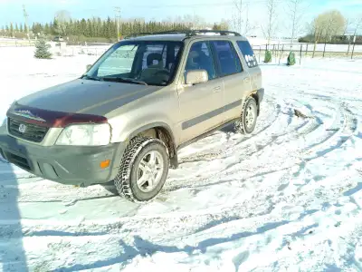 2001 Honda CRV with 412,000kms. The car is AWD and has winter tires on it. It runs and drives, every...