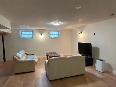 Newly renovated room available for rent in a spacious 1500 sq. ft. two-bedroom basement apartment. T...