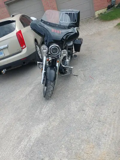 2005 Yamaha Midnightstar 1700, 97k and riding regularly, batwing fairing, hard Harley saddlebags wit...