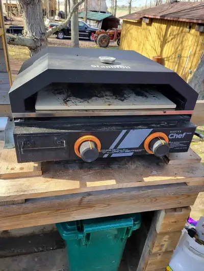 Used propane griddle with pizza oven! Pizza oven has a pizza stone inside it. There is a hinged lid...