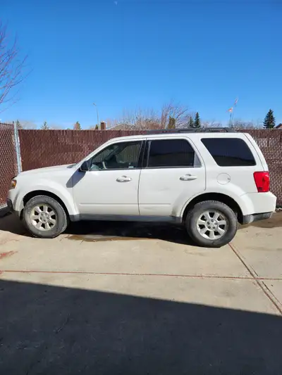 Mechanic special, 2009 Mazda tribute 3.0 V6 4WD Auto Loaded 175000km. Remote car starter. New winter...