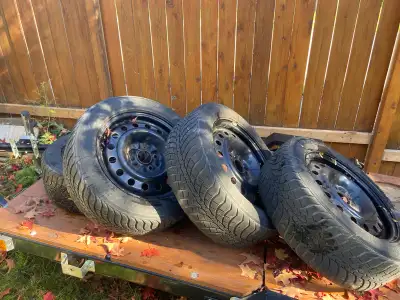 Kumho WinterCraft WP71 tires, sized 215/65 R16, designed to provide traction on icy and snow-covered...
