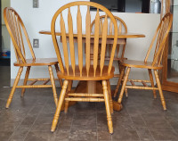 Solid oak round table with 4 chairs