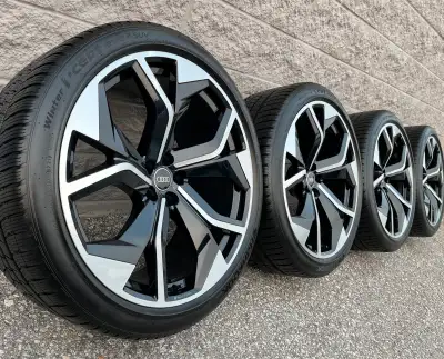 Hankook i*Cept Evo2 SUV AO Snow Tires and original 23 inch Audi RSQ8 "Audi Sport" Two-Tone Black rim...