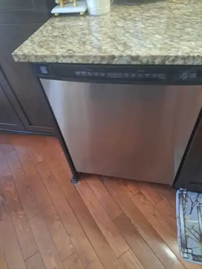 This stainless steel Kenmore dishwasher is in condition and ready to help you tackle your kitchen cl...