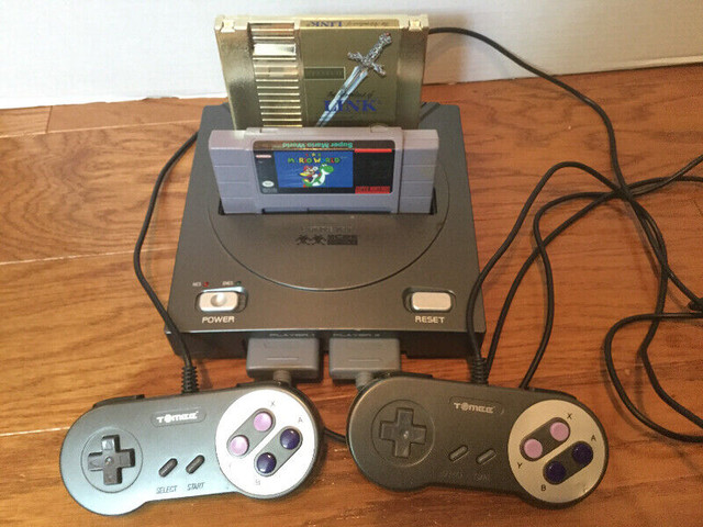 TOMEE C2 NINTENDO NES SNES DUAL VIDEO GAME CONSOLE in Older Generation in Moncton - Image 2