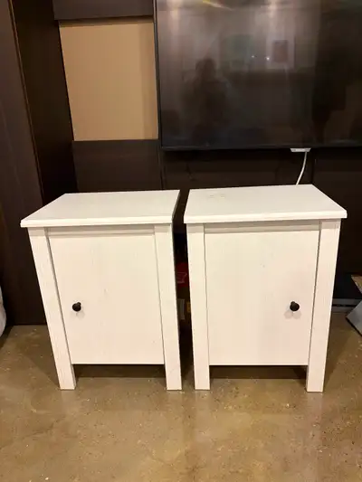 2 white ikea nightstands; in good condition - slight stain mark on top of one but otherwise perfect....