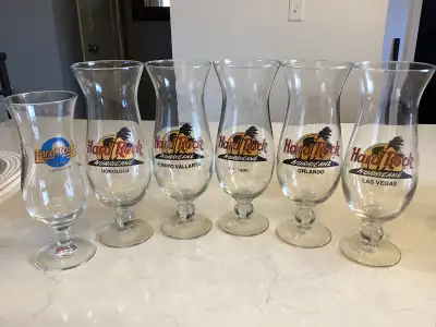 Set of 6 Hard Rock Cafe hurricane glasses from various locations. Great for collectors or for entert...