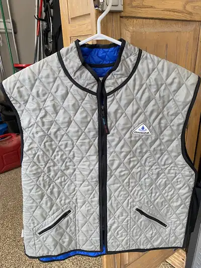 Techniche "Hyperkewl" cooling vest for riding or working outside in extreme hot weather. Simply imme...
