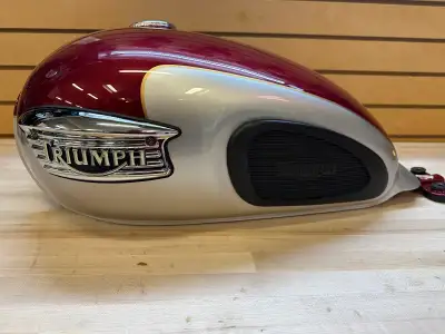 Clean, original fuel tank for a Carbureted Bonneville, Thruxton or Scrambler 2001-2008. This particu...