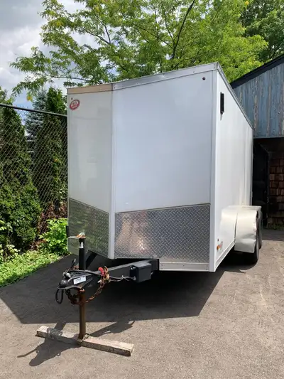 Selling a solid and reliable 6x12 Action utility trailer with twin axles and a full rear ramp door f...