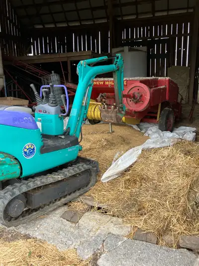 Gas komatsu pc03 1100h has an extra one way valve for post auger/ breaker. Small machine, fits throu...