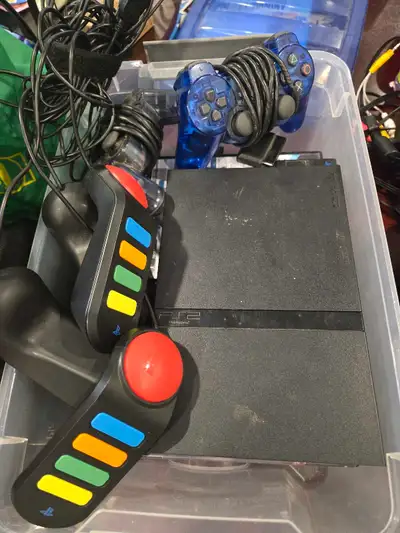 Playstation 2 Slim + Games, View more