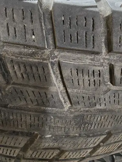 2 Yokohama snows. A few seasons left. The rubber is still soft was kept indoors