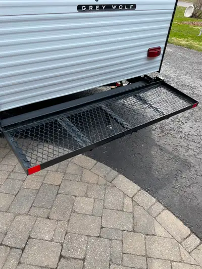 For sale. Cargo carrier, mounts onto bumper and frame at rear of trailer. Carries approx 250 lbs not...