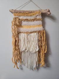 Yellow and white wall hanging 