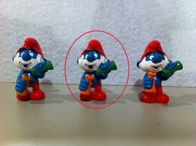 This ads shows 3 variants of Papa Smurf with test tubes and is offering the one circled in RED. Exce...