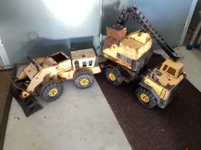 2 well used tonka toys may use for parts , or handy man clean them up . $50 , OBO