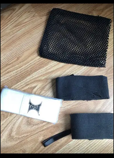 Brand new without tags TAPOUT Junior MMA wrist wraps....2 white and 2 black...white ones are still i...