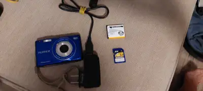 Selling a used Fujifilm JX500 digital camera, perfect for casual photography. This compact camera fe...