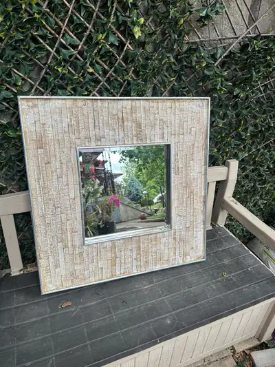 Decorative wall mirror with a stylish wide wooden frame, View more