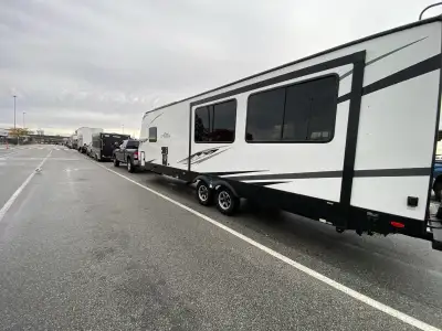 Double slides Front Walk around bed “Plastic is still on the mattress “ Rear Office Walk around Kitc...