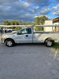 2007 FORD-F150 Pick up Truck with custom aluminum rack.
