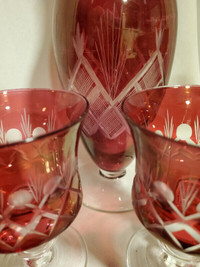 Vintage Cut to Clear Cranberry decanter and two stem glasses