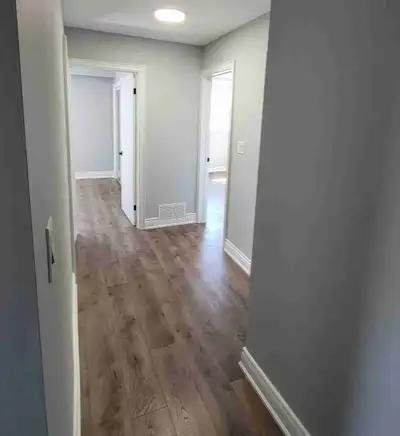 This newly renovated 1-bedroom apartment features modern finishes, including sleek grey cabinetry, a...
