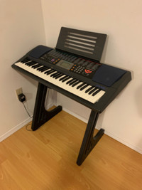 Casio CTK-501 electronic keyboard with stand