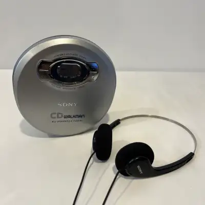 SONY D-EJ611 SILVER PORTABLE CD WALKMAN PLAYER W/ ORIGINAL MDR-006 HEADPHONES. Condition is very goo...