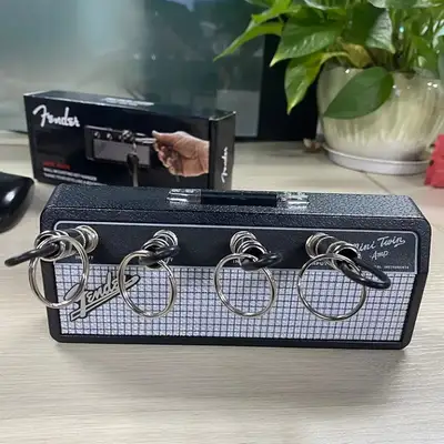 Brand new in box Hang your keys like a rockstar with the Fender Jack Rack! Comes with a sleek finish...