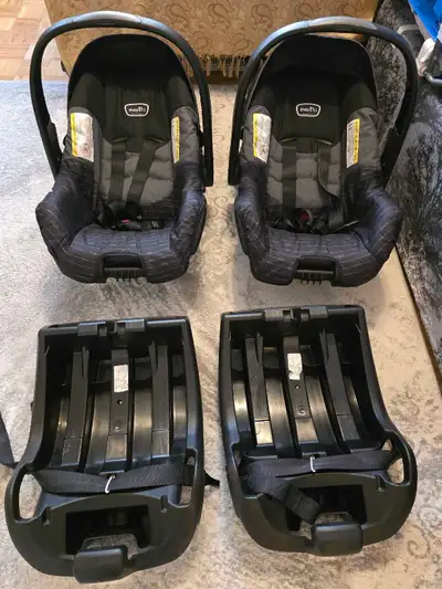 I'm selling two Evenflo Nurture car seats, manufactured in August 2021, along with their bases. And...
