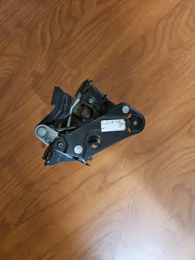 This is a used hood latch assembly. It is a functional replacement part for your vehicle. Please rev...