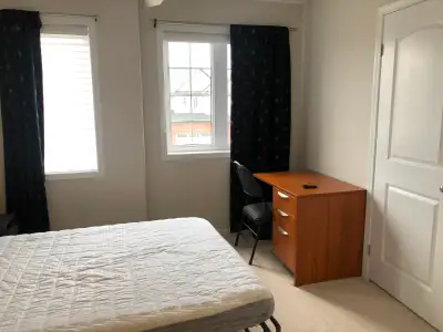 Furnished Room for rent for a single person in a three bedroom house , shared bathroom, free parking...