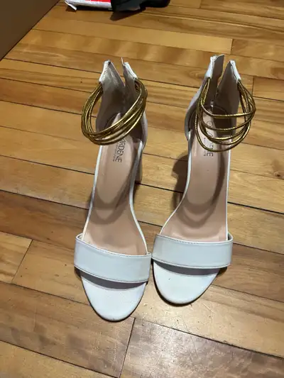 White high heel shoes zipper back and gold ankle straps. Size 8 $8