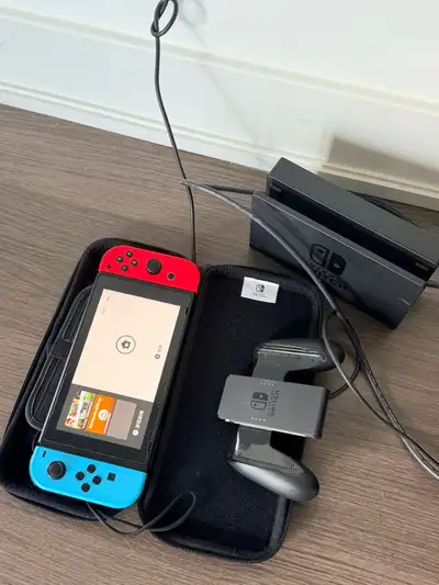This Nintendo Switch console is in good pre-owned condition and ready for your gaming adventures. It...