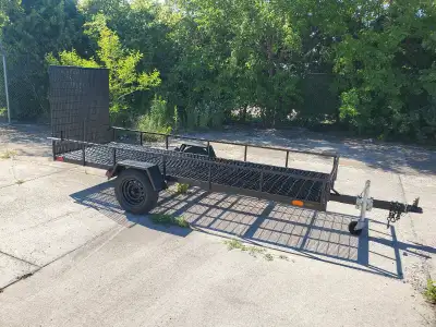 5'×12' Utility trailer with fold down ramps. Best offer can take it home