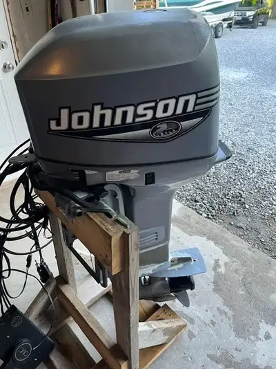 2000 JOHNSON 25HP 2 STROKE POWER TRIM ELECTRIC START COMES WITH REMOTE THROTTLE CONTROLS DASH INDICA...