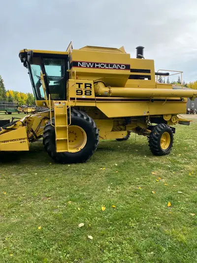 With 25 straight cut header with trailer and pick up Field ready 4000 engine hour 3000 separator hou...