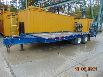 1986 Martin 20 ton 20' tag-a-long, tandem trailer w/ drop ramps. Contact Terry 905-939-7755, 6000.00...