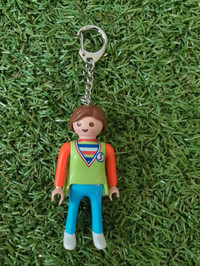 Used Playmobil Green tshirt woman keychain 1998