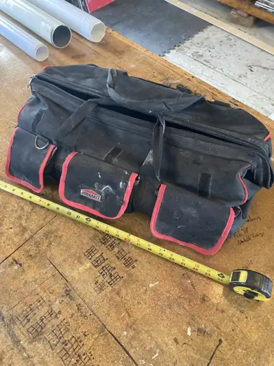 Large tool bag, 24 inches by 12. Zipper works well, has several pockets. Located in Manotick.