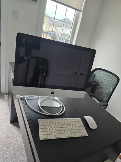 apple desktop with keyboard and mouse, View more