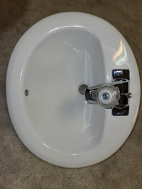 Bathroom sink with tap