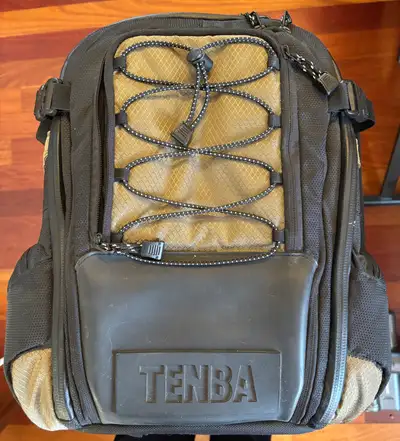 I'm selling a used Tenba Shootout Daypack camera bag in new condition, perfect for photographers on...