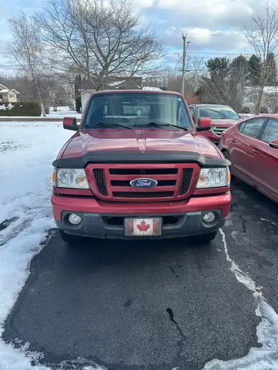2010 ford ranger in great condition! Low kilometres, custom flatbed, winter and all season tires on...