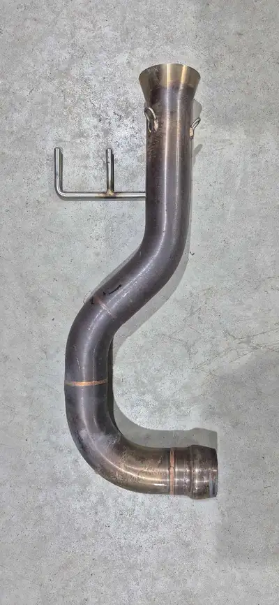 Muffler delete pipe from my 2019 Can-am Spyder F3. Stainless construction, precision fit.
