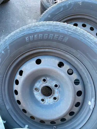 Get ready for the road with this set of four Evergreen all-season tires, sized 235/65R17 104S, mount...