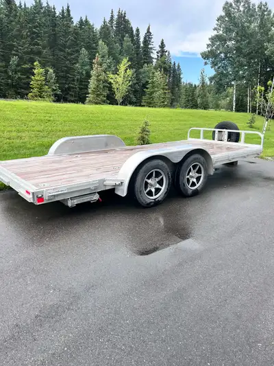 Like new 16 ft flatdeck aluminum trailer. Rarely used. Strong Haul brand 82” x 16 ft Aluminum wheels...